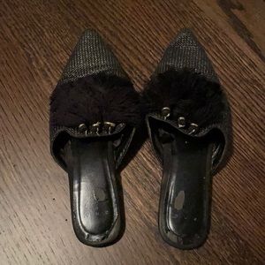 Black rattan flats with tassels